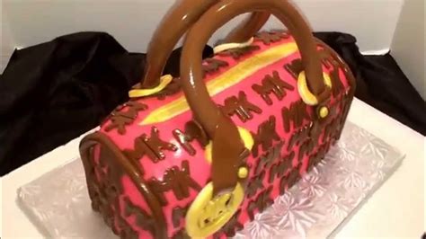 Michael Kors handbag cake! Made by thecakebossofchester at